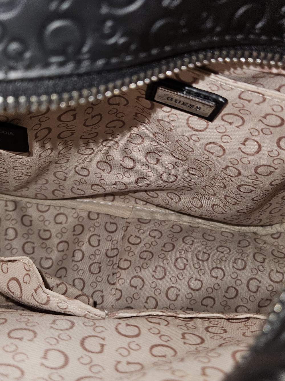 GUESS Black Embossed Logo Mini Backpack - Picture 3 of 3